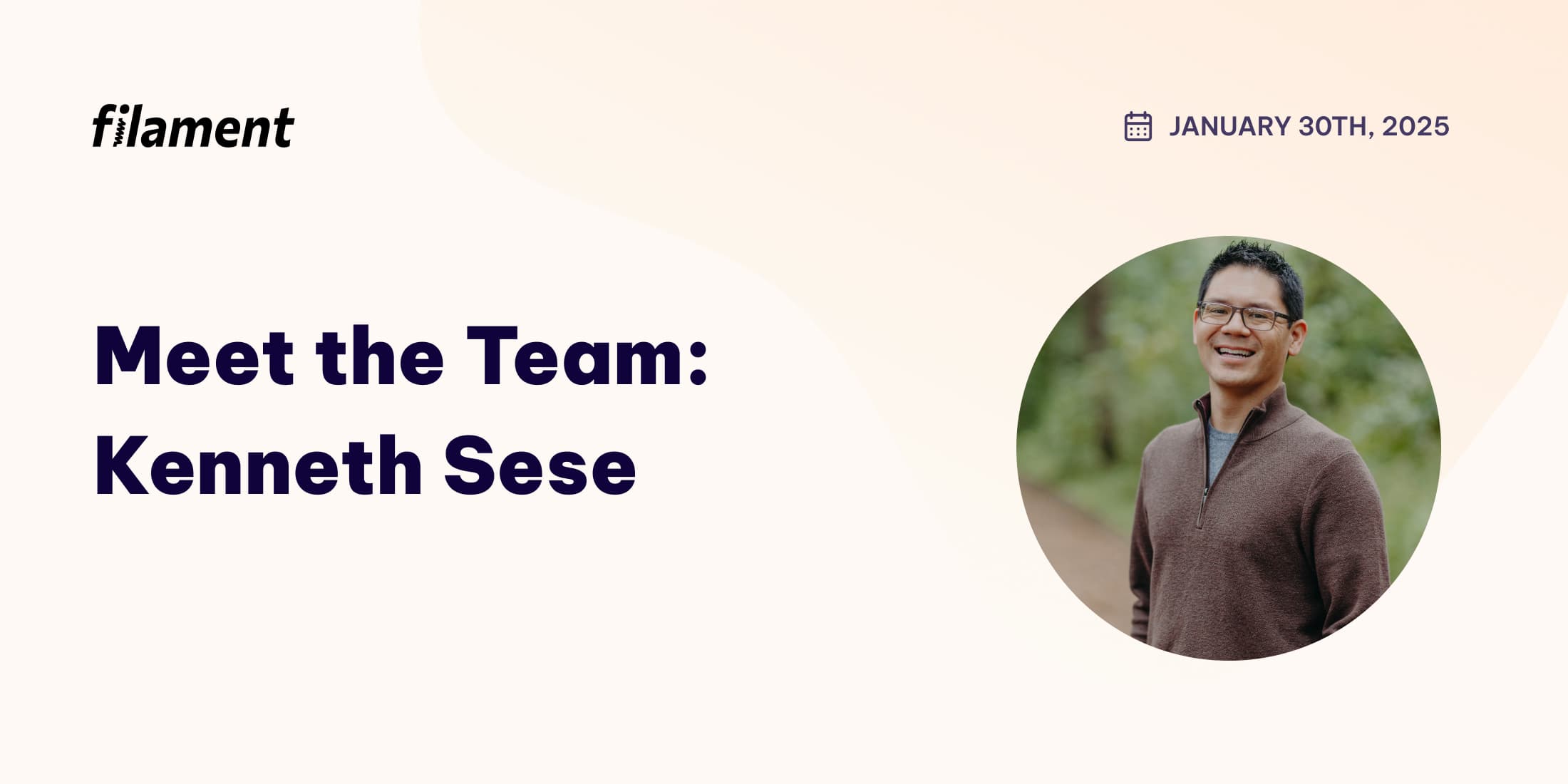 An image with the words 'Meet the Team: Kenneth Sese' on the left, and a photo of Kenneth standing outside in a brown quarter-zip sweater on the right.